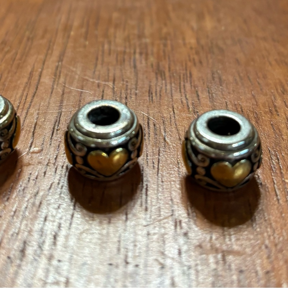 Brighton, silver, gold and black bead.   Listing is for one bead only.